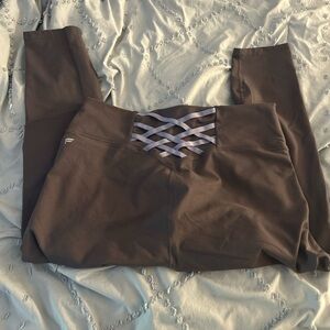 Grey leggings with lilac purple Crisscross Detail